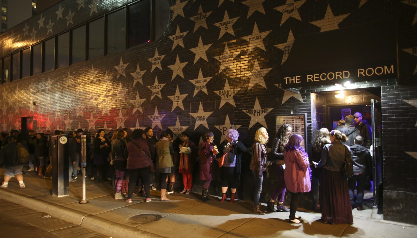 Poetry fans filed into The Record Room for The Prince Purple Poetry Party Wednesday night at First Ave. ] JEFF WHEELER &#x2022; jeff.wheeler@startribune.com One of the off-site events at the start of the AWP Conference & Bookfair was The Prince Purple Poetry Party Wednesday night, April 8, 2015 in The Record Room at First Ave. in Minneapolis. More than a dozen poets read poems they wrote that were inspired by the music of Prince.