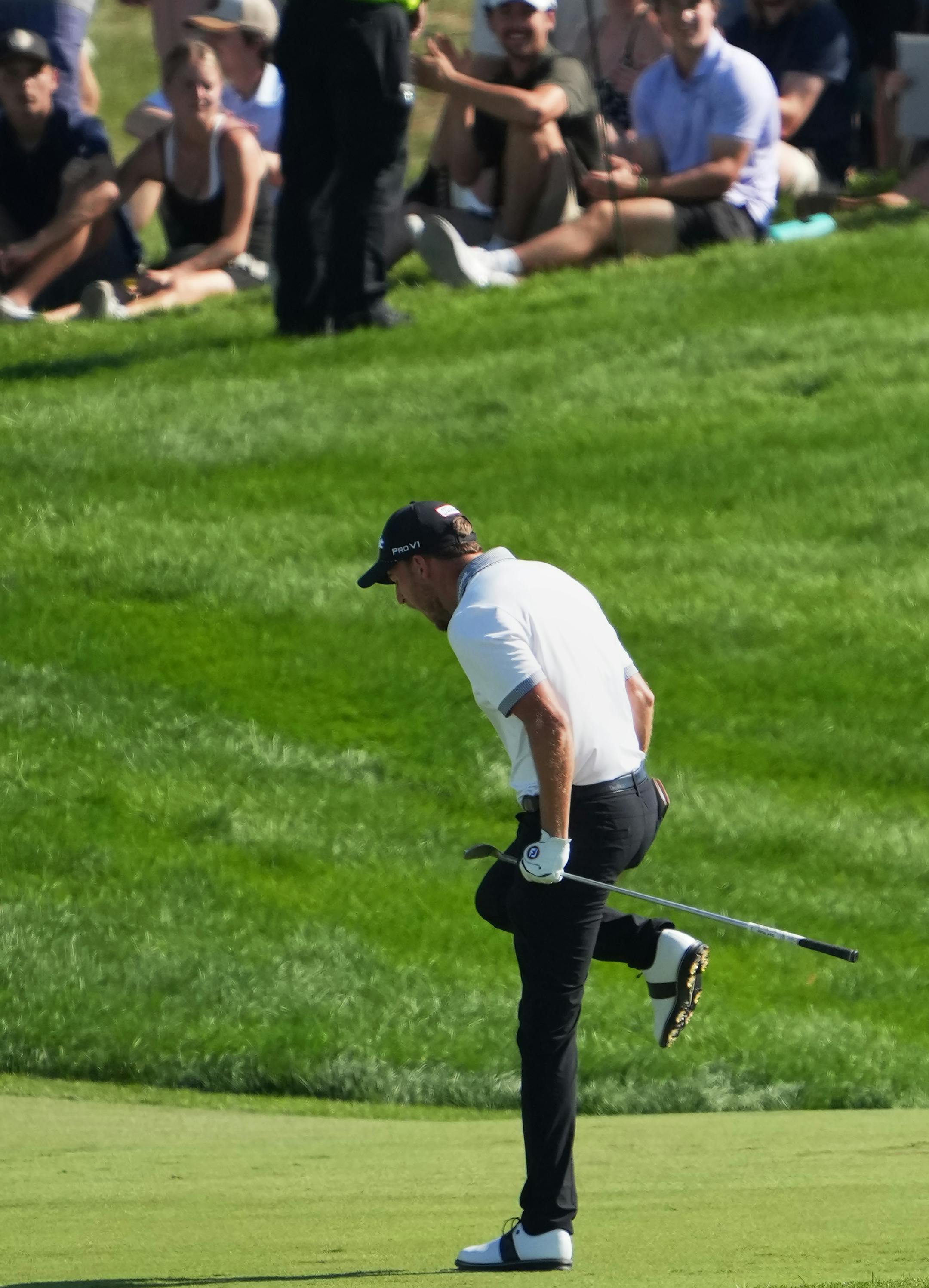 Lee Hodges celebrates a spectacular green shot on the 18th hole of the 3M Open.