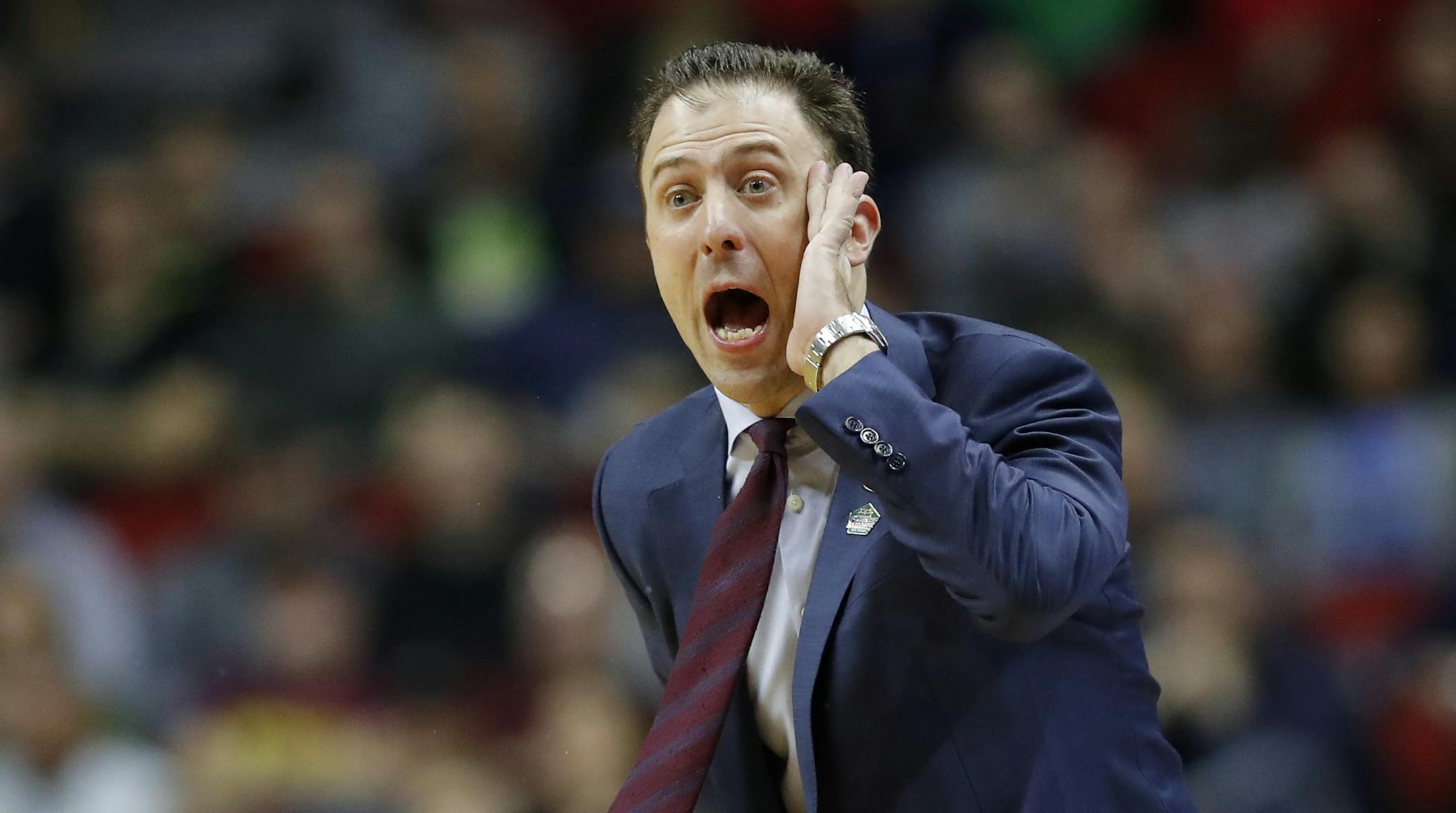 Gophers coach Richard Pitino directs his team during Thursday's first-round game against Louisville in the NCAA Tournament.