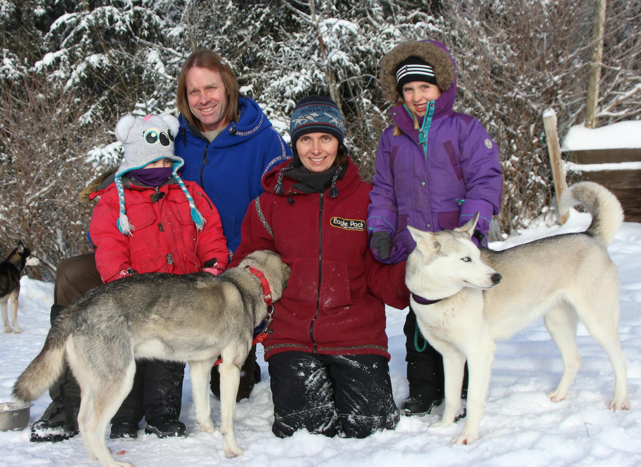 The Freking family (l to r): Nichole, Blake, Jen and Elena with sled dogs Janis and Boo Boo.