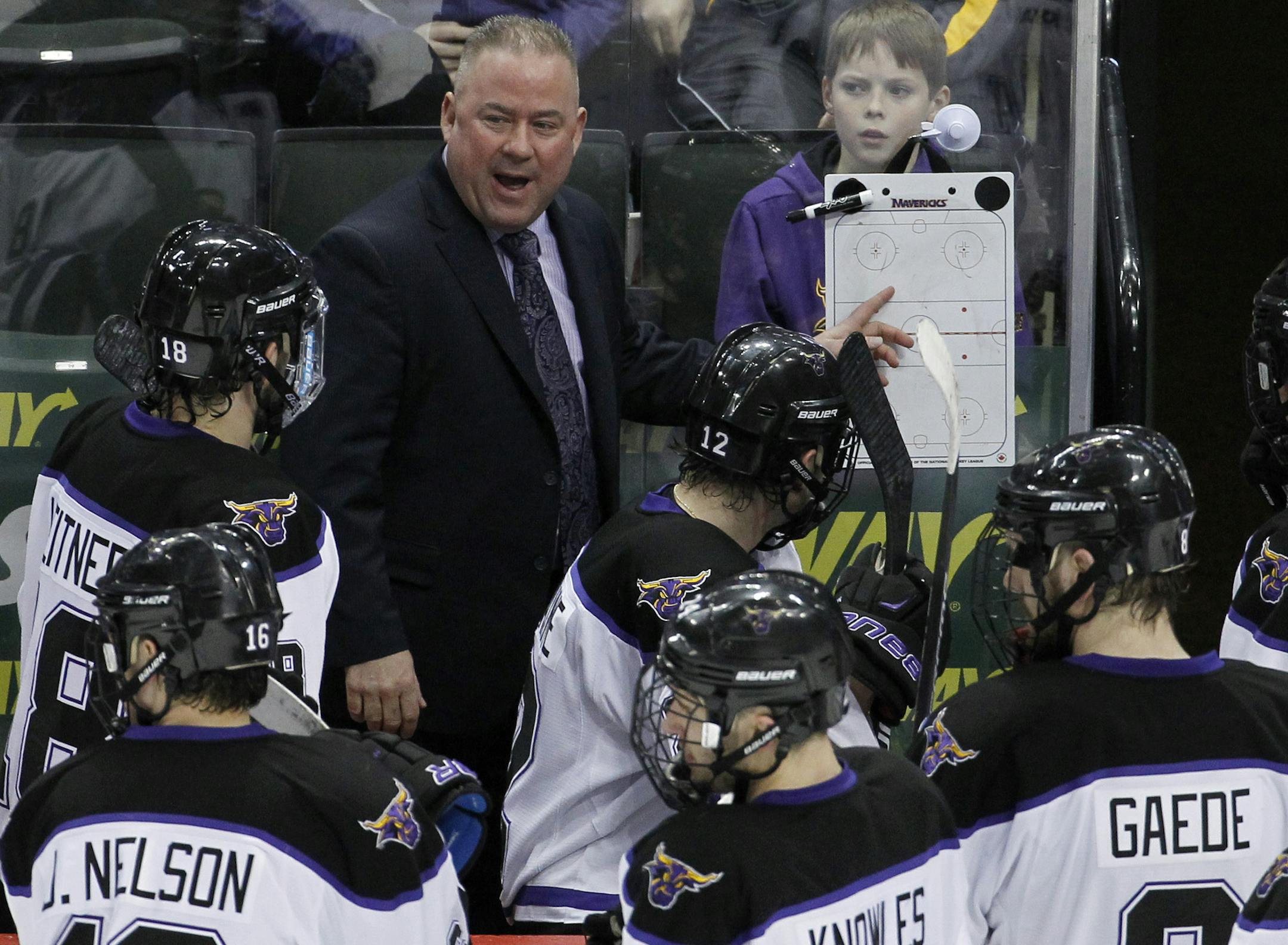 Minnesota State Mankato head coach Mike Hastings talks with his players during the third period of the WCHA Final Five college championship hockey game against Michigan Tech in St. Paul, Minn., Saturday, March 21, 2015. Minnesota State Mankato won 5-2. (AP Photo/Ann Heisenfelt)