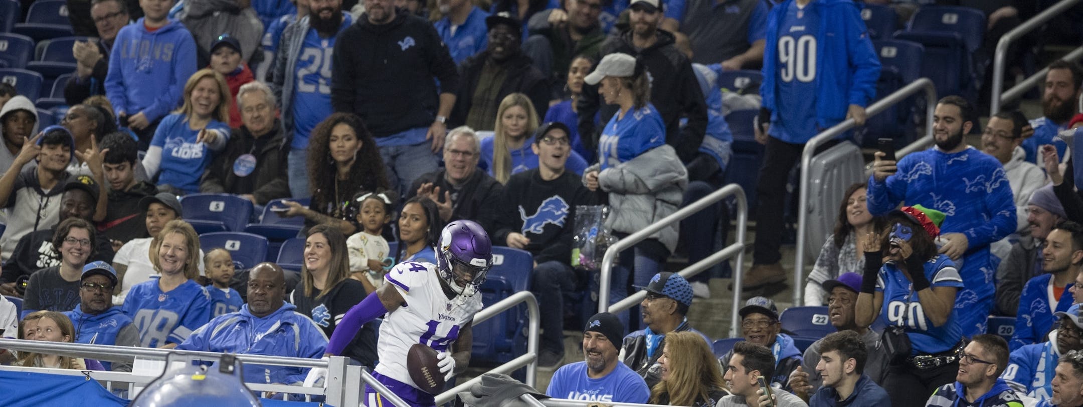 Minnesota Vikings wide receiver Stefon Diggs (14) sat with a few Lions fans after he scored a touchdown in the second quarter at Ford Field Sunday December 23, 2018 in Detroit, MI.