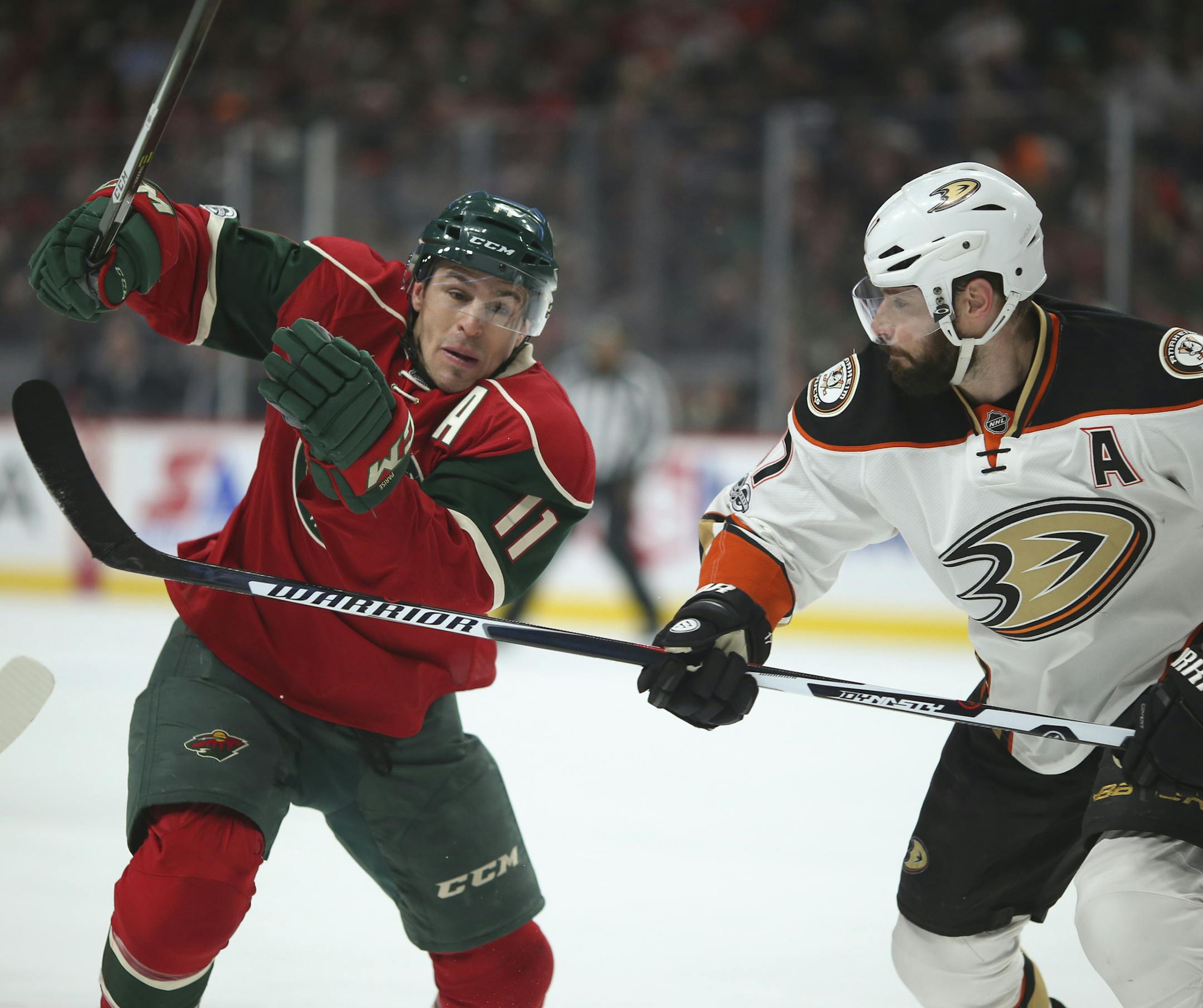 Anaheim Ducks center Ryan Kesler (17) defended as Wild left wing Zach Parise (11) skated for a puck in the corner in the first period. ] JEFF WHEELER ï jeff.wheeler@startribune.com The Minnesota Wild faced the Anaheim Ducks in an NHL hockey game Tuesday night, February 14, 2017 at Xcel Energy Center in St. Paul.