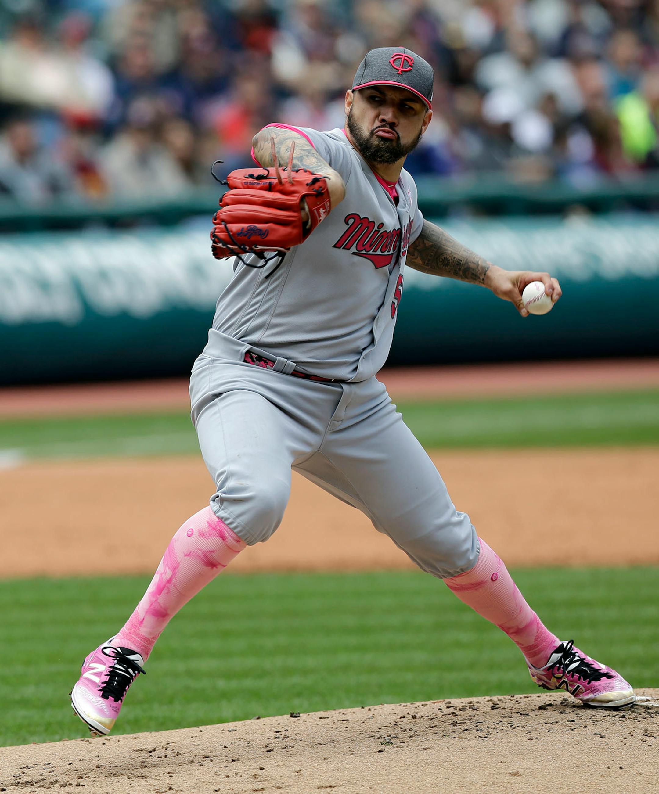 Minnesota Twins' Hector Santiago delivers in the first inning of a baseball game against the Cleveland Indians, Sunday, May 14, 2017, in Cleveland.