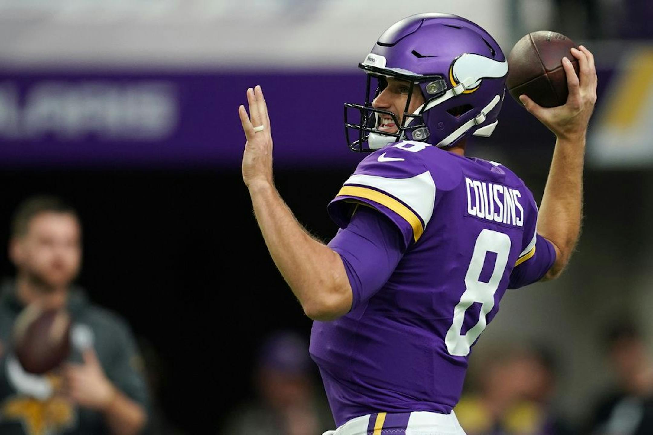 Minnesota Vikings quarterback Kirk Cousins (8) threw a warm up pass ahead of Sunday's game against the Philadelphia Eagles.