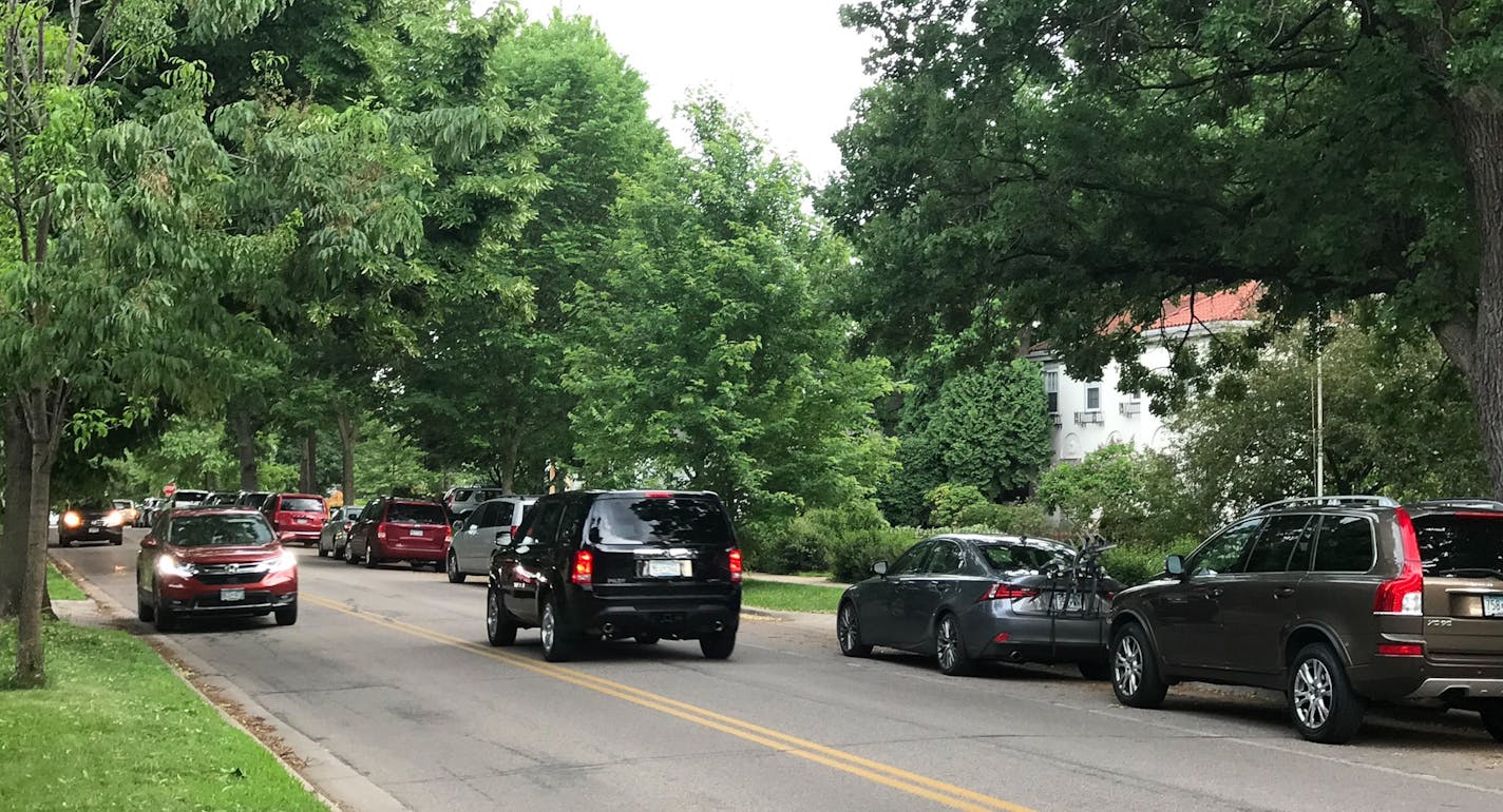 Under a proposal recommended by city staff, parking on Wooddale Avenue between 44th Street and 42 1/2 Street in St. Louis Park would be removed to make way for a striped bike lane. Some trees would also be cut down.