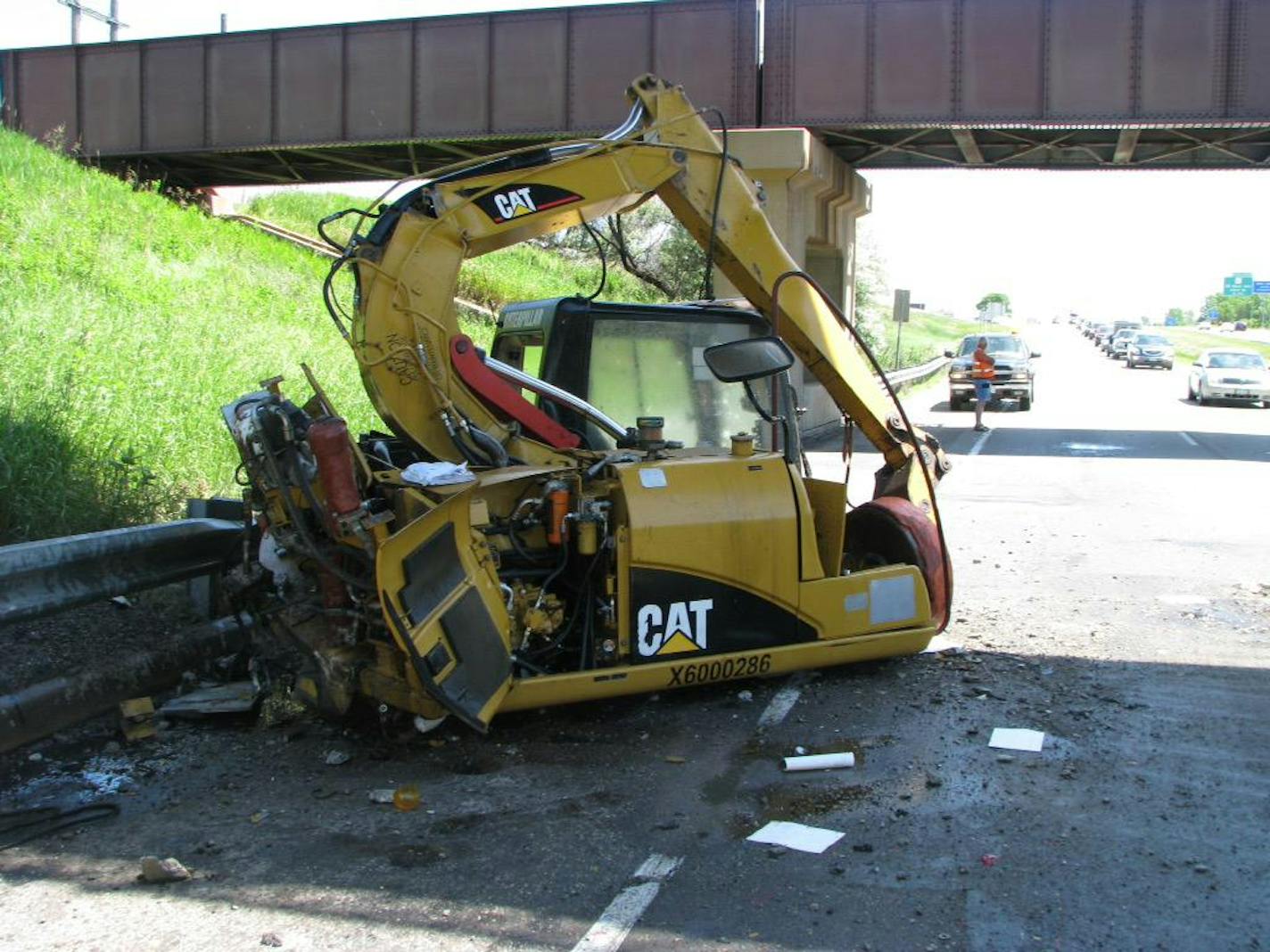 This crane toppled from a semi in Moorhead after striking an overpass.