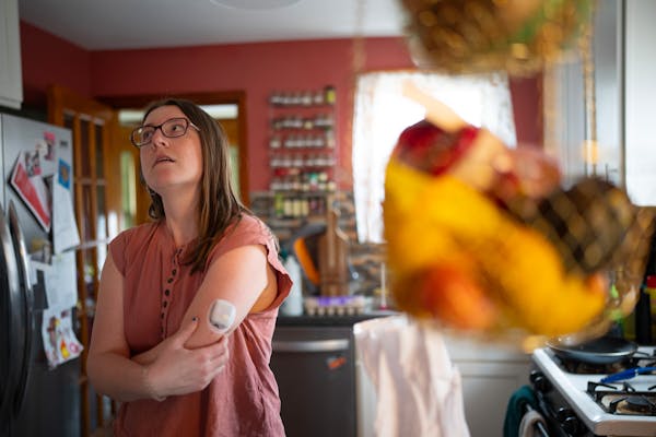 In South St. Paul, Abigail Turner waited for a fresh insulin pump to begin administering the drug. Turner is juggling a variety of debts, but medical 