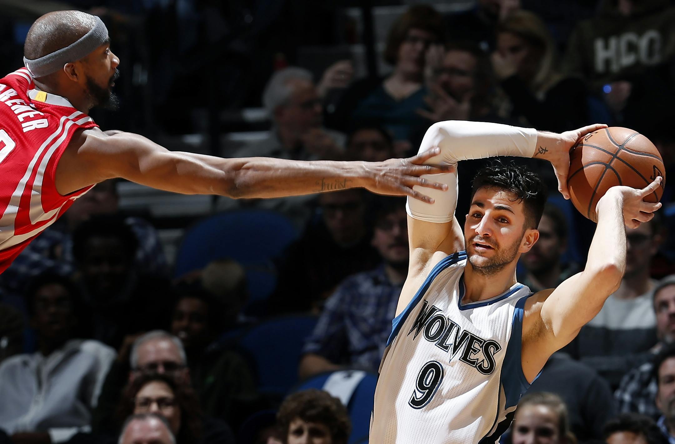 Ricky Rubio (9) was defended by Corey Brewer (33) in the third quarter Wednesday.