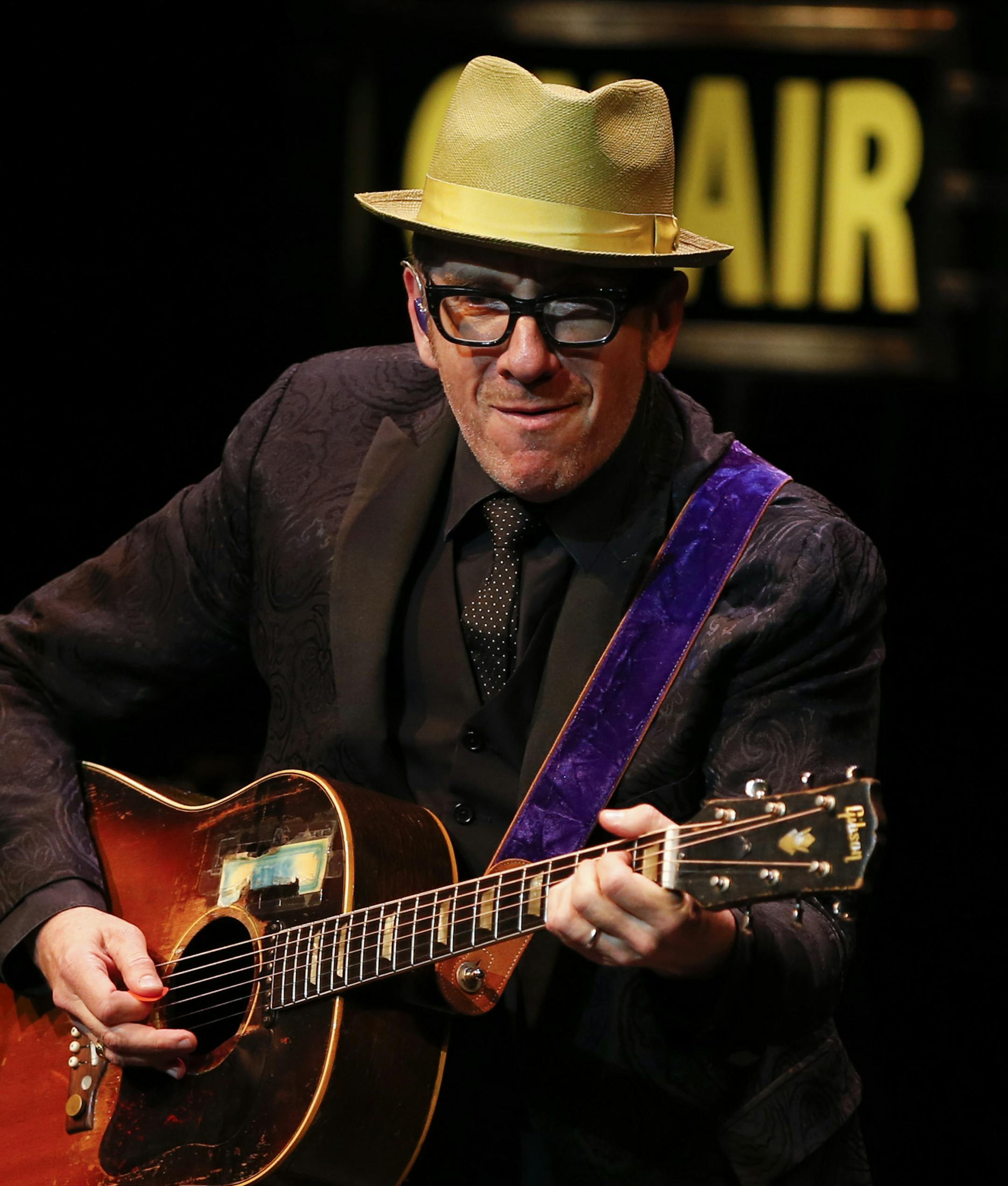 Elvis Costello, early in his set at the O'Shaughnessy Auditorium in St. Paul Monday night. It was his first Twin Cities appearance as a solo act. ] JEFF WHEELER ‚Ä¢ jeff.wheeler@startribune.com Elvis Costello began a solo tour of the U.S. with a show at O'Shaughnessy Auditorium on the campus of St Catherine University in St. Paul Monday night, June 9, 2014.