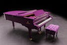 This undated photo released by Yamaha Entertainment Group shows a custom-made purple piano the company manufactured for musician Prince. Days before h