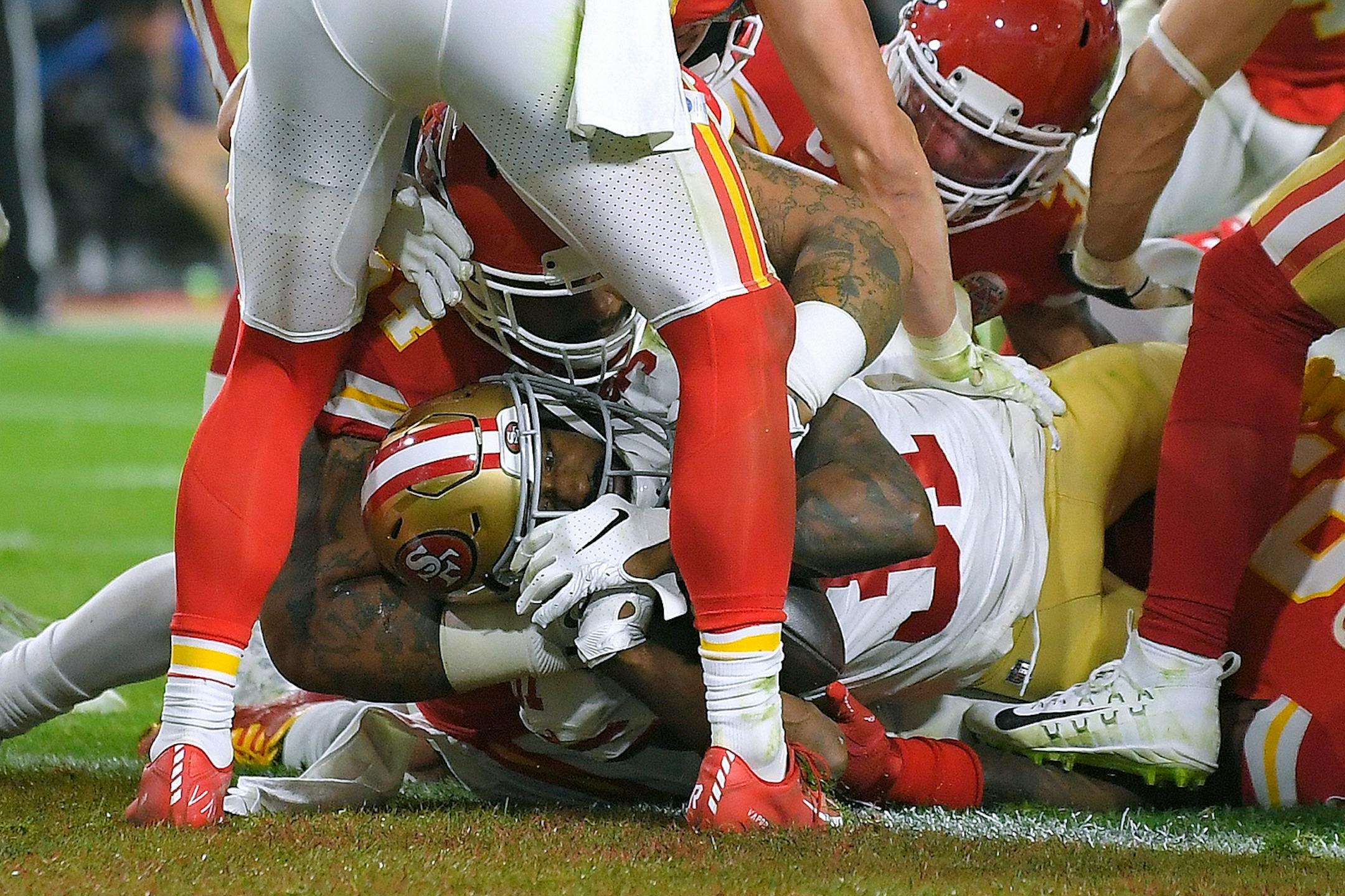 San Francisco 49ers' Raheem Mostert dives across the goal line for a touchdown against the Kansas City Chiefs during the second half of the NFL Super Bowl 54 football game Sunday, Feb. 2, 2020, in Miami Gardens, Fla.