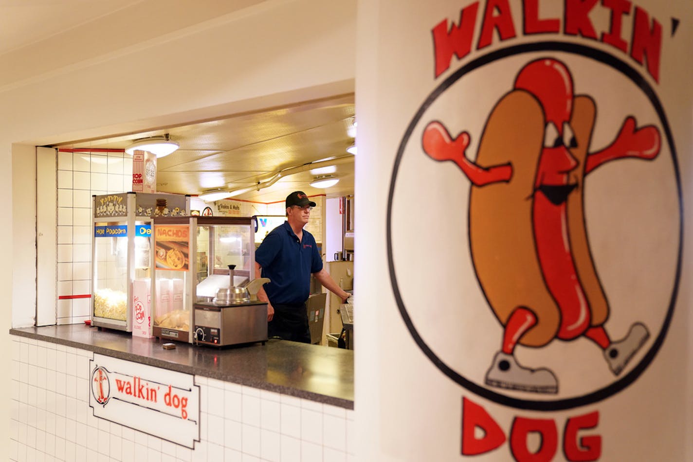 Walkin' Dog is wedged into a dark corner of Northstar Center's first-floor food court, a busy pass-through off the skyway system in downtown Minneapolis.