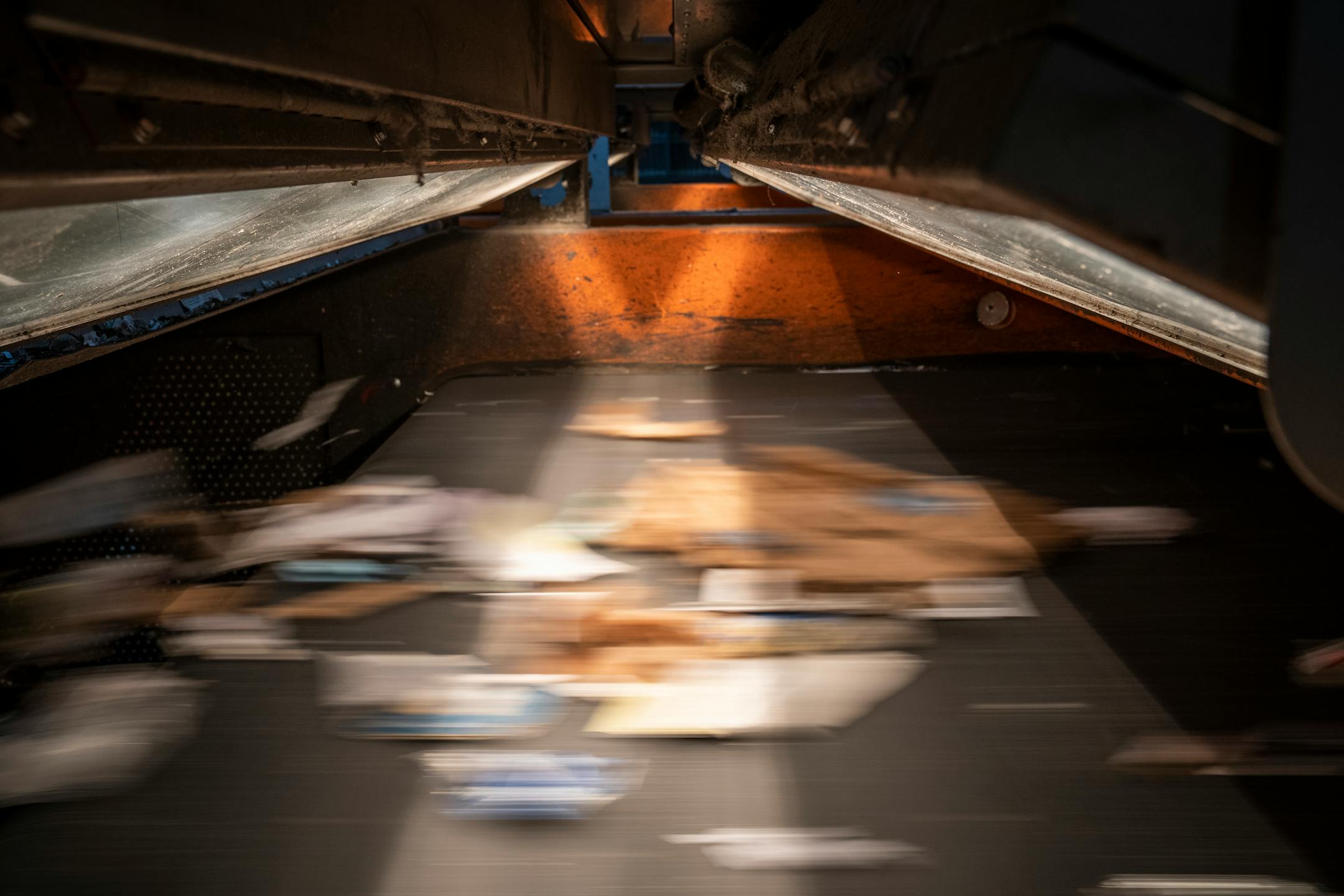 Cardboard is sorted inside an optical sorter in the single stream recycling facility.