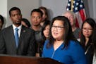 DFL Rep. Kaohly Her, seen at a 2018 news conference with Mayor Melvin Carter, said both her jobs are to advocate for St. Paul constituents.