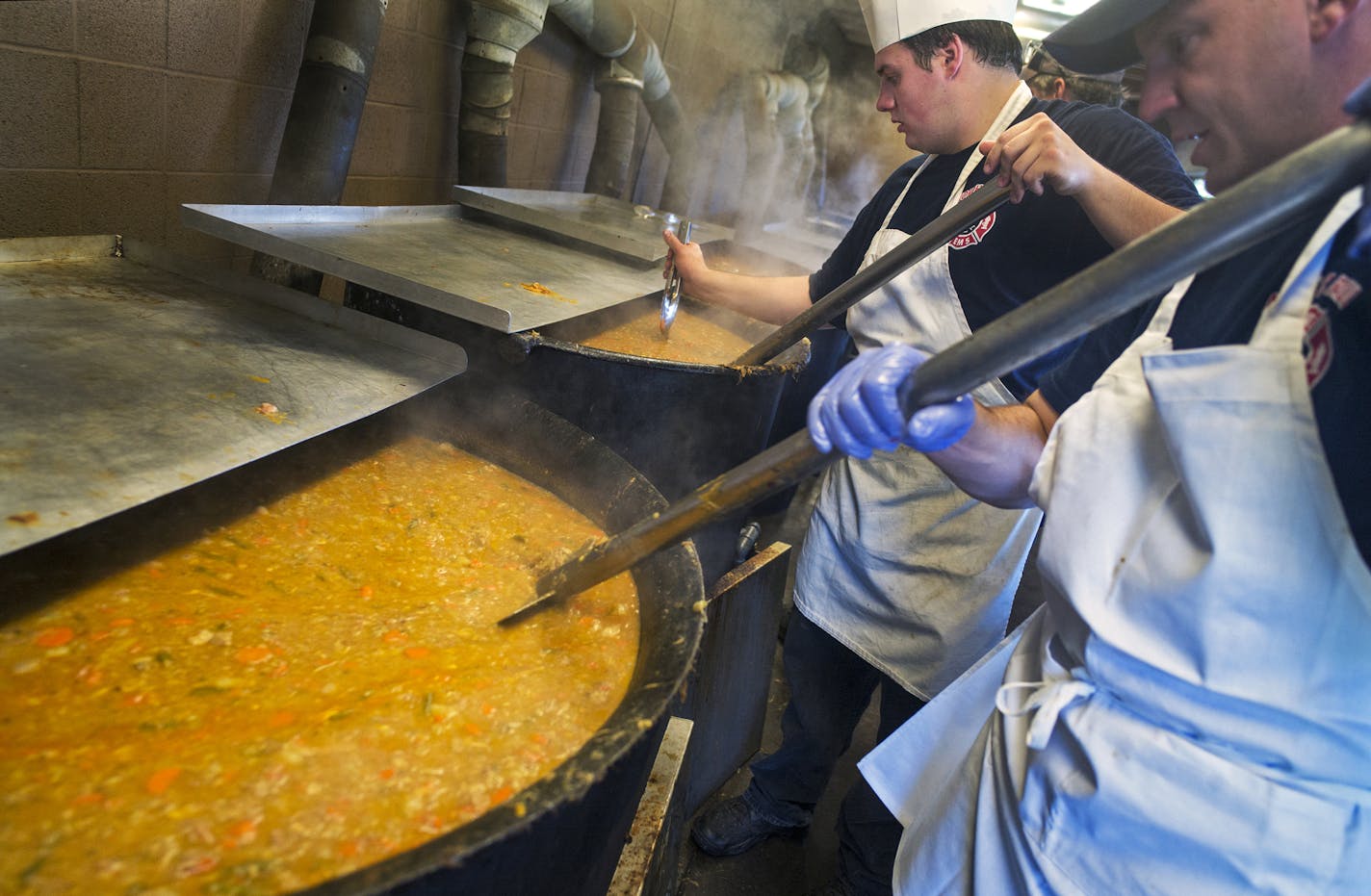 At the annual booya fundraiser in North St. Paul, Bill Weber, whose great-grandfather created the recipe in 1927, stirred one of the cooking pots.