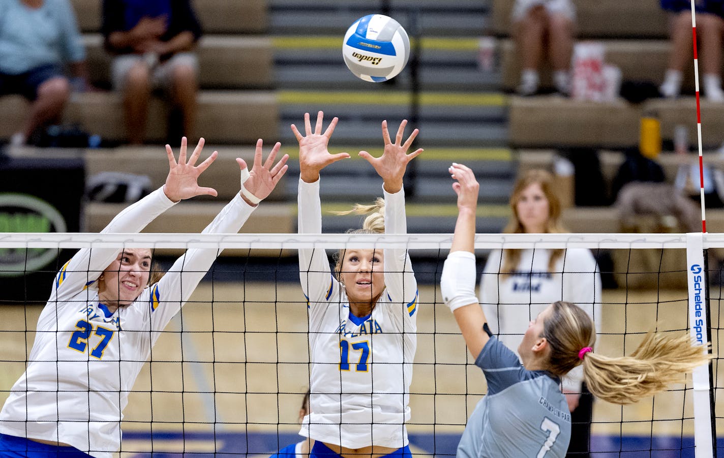 Katie Kelzenberg (27) and Avery Jesewitz (17) of Wayzata attempt to block Carly Gilk (7) of Champlin Park Tuesday, September 26, 2023, at Wayzata High School in Plymouth, Minn. ] CARLOS GONZALEZ • carlos.gonzalez@startribune.com