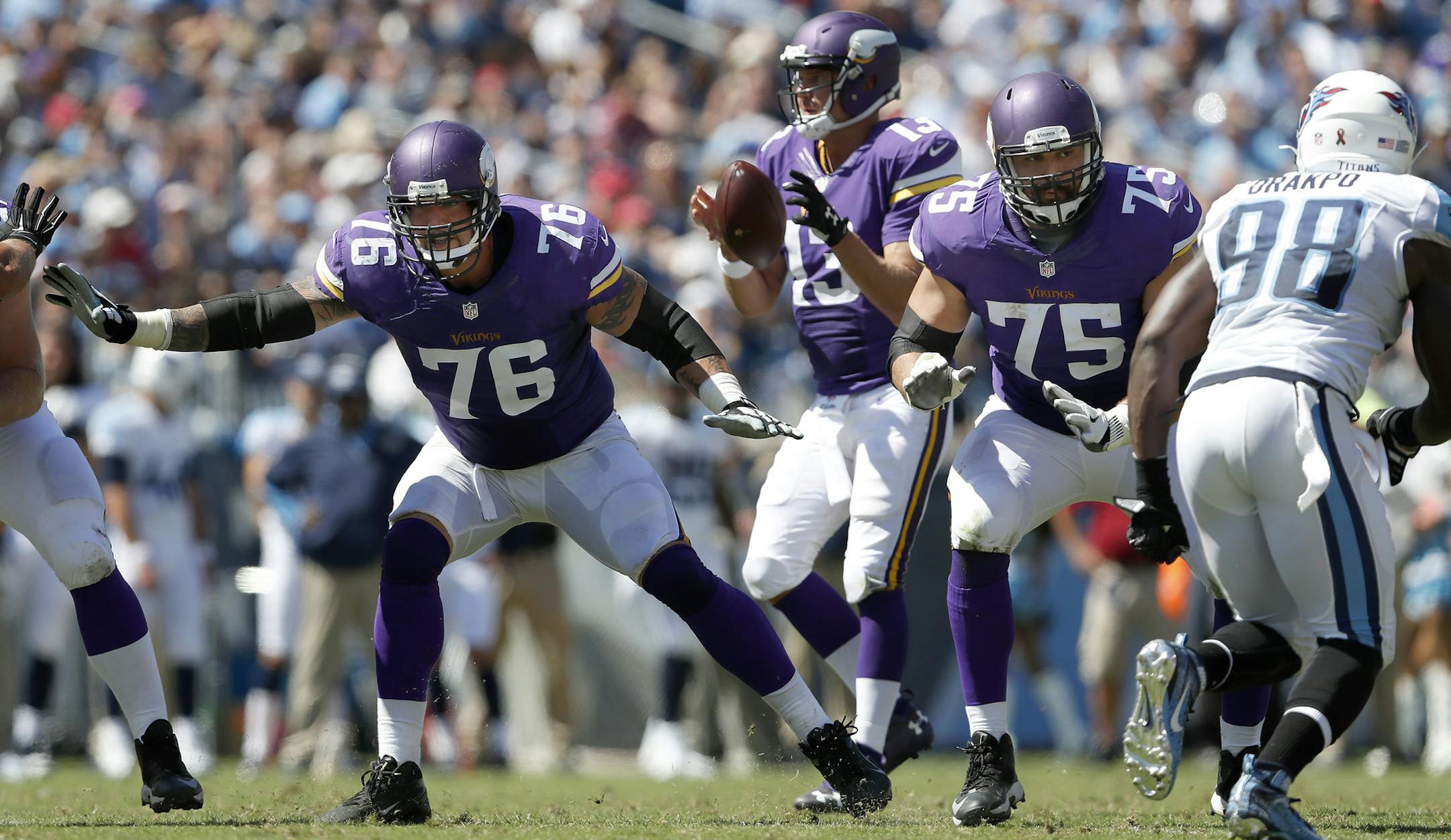 While the Vikings offensive line, including Alex Boone (76) and Matt Kalil (75), struggled to open holes, it did manage to keep QB Shaun Hill upright.