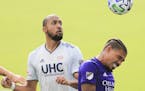 Orlando City's Junior Urso, left, headed the ball past New England forward Teal Bunbury, who grew up in Prior Lake, in their Eastern Conference semifi