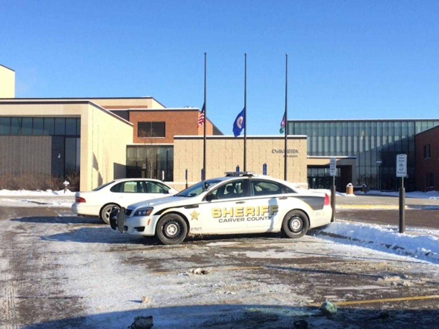 Police cars outside Chanhassen High School on Tuesday.