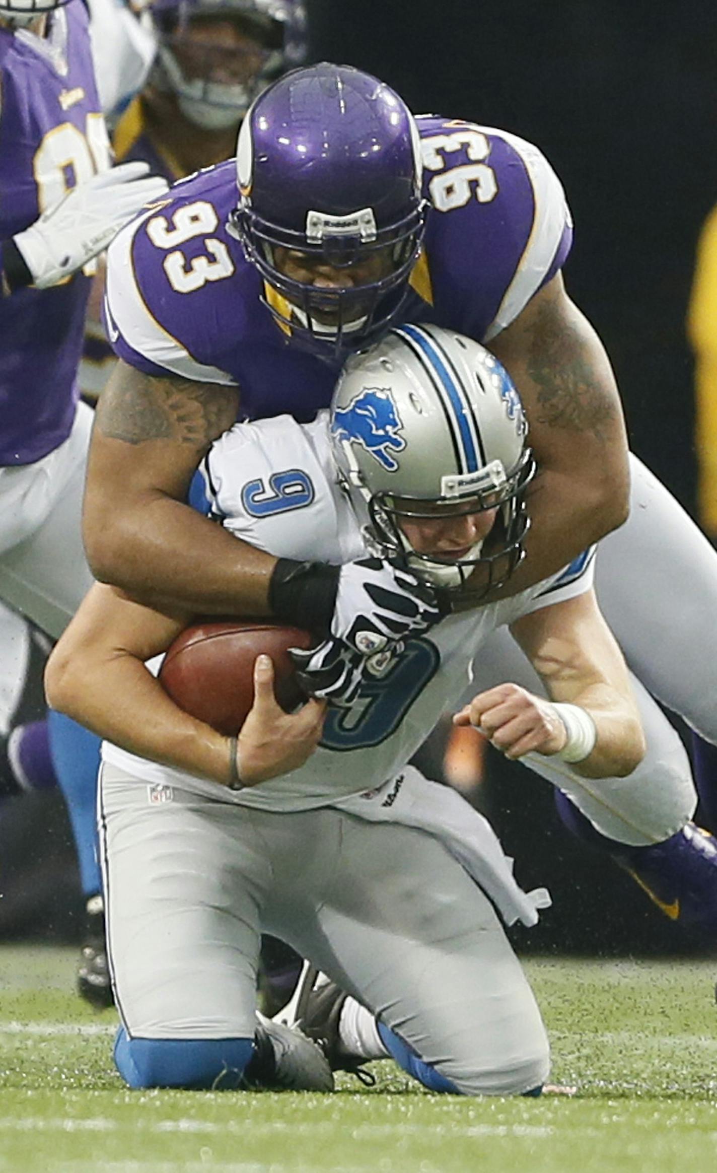 Detroit Lions quarterback Matthew Stafford (9) was sacked by Minnesota Vikings defensive tackle Kevin Williams (93) in the second quarter of NFL action between the Detroit Lions and the Minnesota Vikings Sunday Nov.11,2012 at Mall of the America Field in Minneapolis, MN.] JERRY HOLT &#x201a;&#xc4;&#xa2; jerry.holt@startribune.com ORG XMIT: MIN1211111337029385