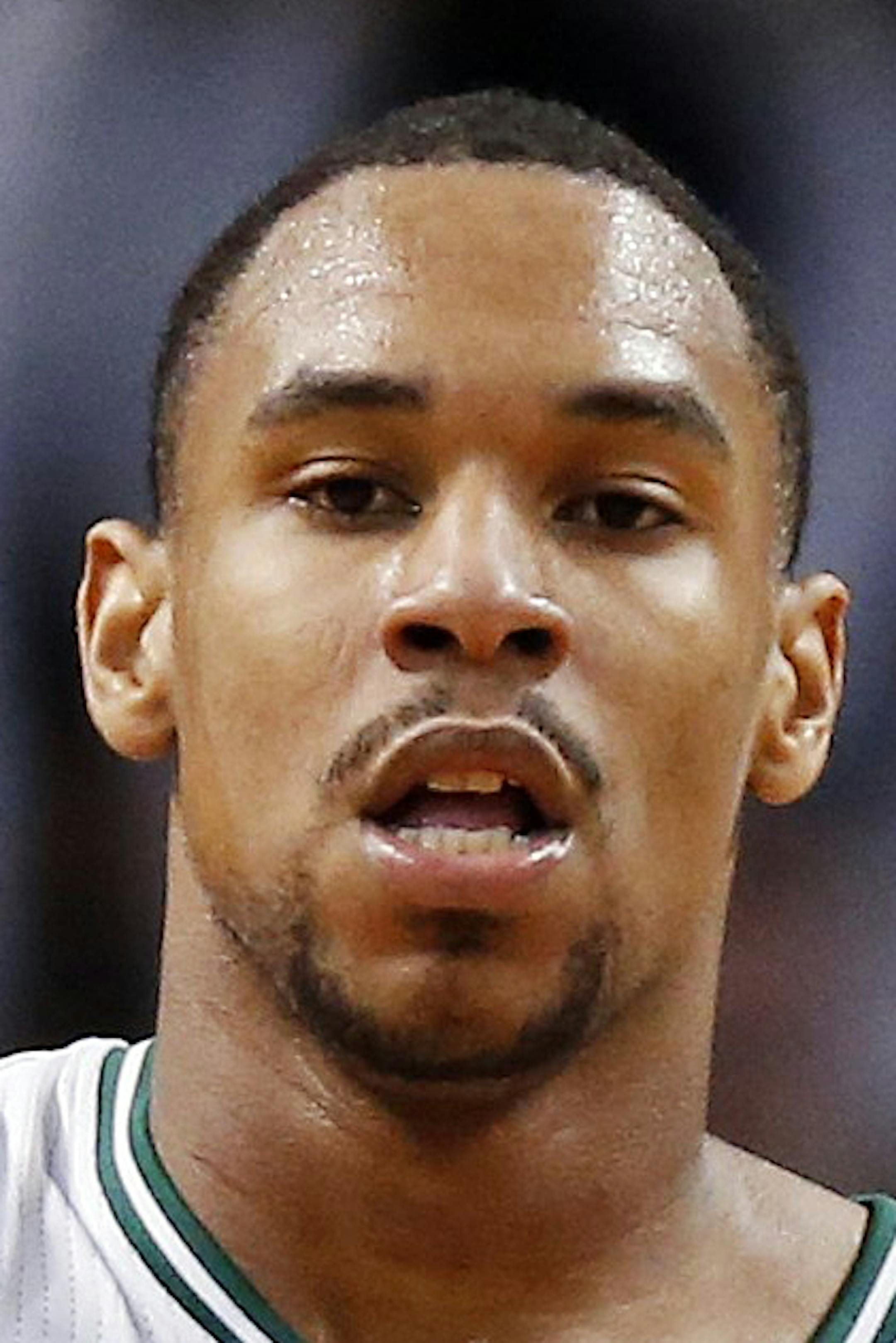 Boston Celtics' Jared Sullinger (7) celebrates his 3-pointer in front of teammate Jordan Crawford (27) in the fourth quarter of an NBA basketball game against the Minnesota Timberwolves in Boston, Monday, Dec. 16, 2013. The Celtics won 101-97. (AP Photo/Michael Dwyer)