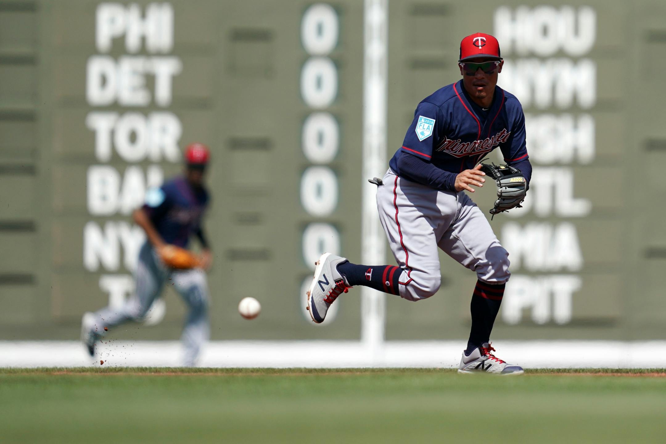 Minnesota Twins shortstop Ronald Torreyes (19) fielded a ball hit by Boston Red Sox shortstop Xander Bogaerts (2) during Sunday's game.