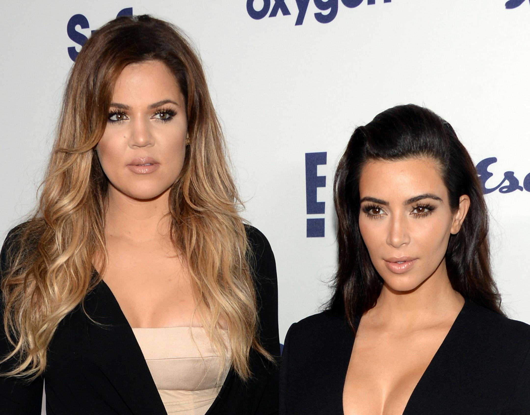 FILE - In this May 15, 2014 file photo, Khloe Kardashian, left, and Kim Kardashian arrive at the NBCUniversal Cable Entertainment 2014 Upfront at the Javits Center in New York. Khloe and Kim Kardashian are safe after the vehicle they were in slid off a Montana road and into a ditch on Saturday, Feb. 21, 2015. Montana Highway Patrol Capt. Mark Wilfore said the accident occurred before noon on a highway between Bozeman and Belgrade, where the Bozeman Yellowstone International Airport is located. W