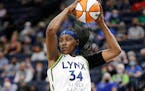 Minnesota Lynx center Sylvia Fowles rebounds during the fourth quarter of the team's WNBA basketball game against the Los Angeles Sparks on Thursday, 