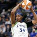 Minnesota Lynx center Sylvia Fowles rebounds during the fourth quarter of the team's WNBA basketball game against the Los Angeles Sparks on Thursday, 