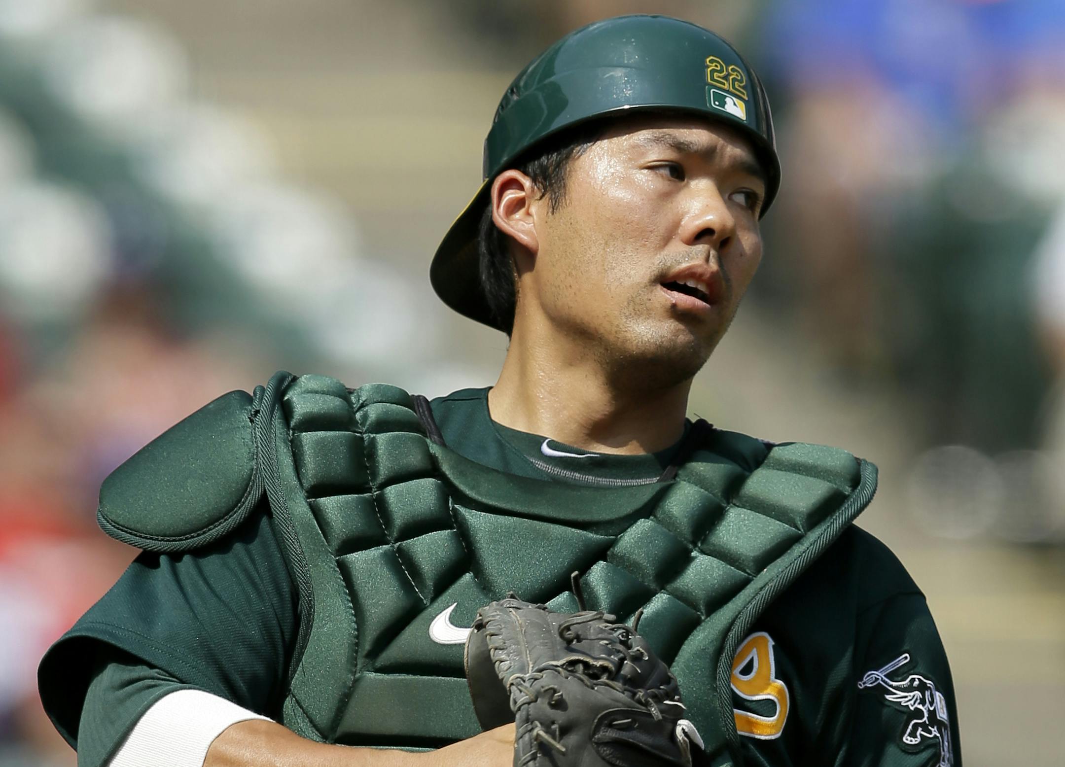 Oakland Athletics' Kurt Suzuki after grabbing a fly ball for an out against the Texas Rangers in a baseball game, Saturday, Sept. 14, 2013, in Arlington, Texas. (AP Photo/Tony Gutierrez) ORG XMIT: NYOTK