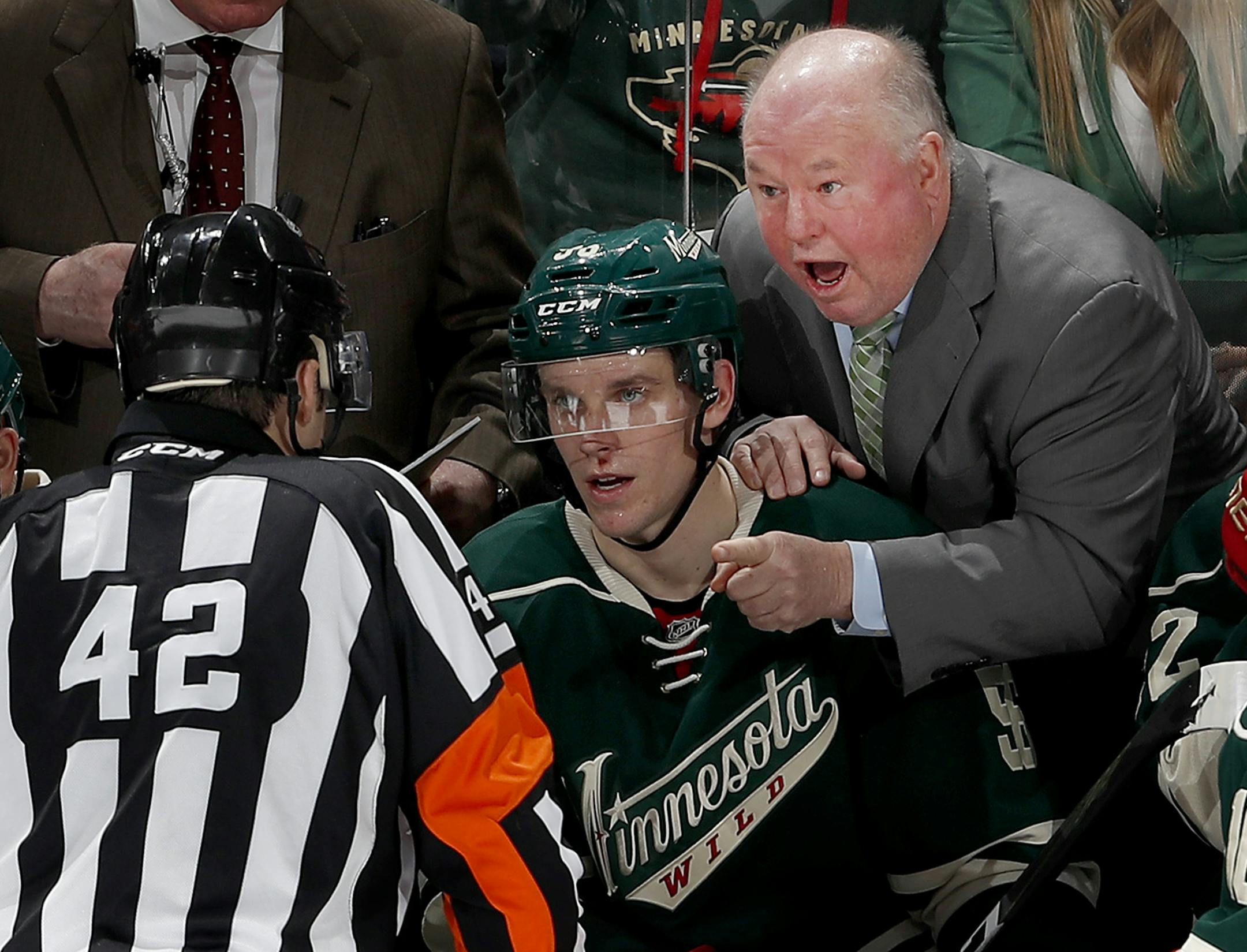 Wild head coach Bruce Boudreau discussed a non-goal call with referee Jake Brenk (42) in the third period. ] CARLOS GONZALEZ cgonzalez@startribune.com - December 11, 2016, St. Paul, Minnesota, NHL Hockey, Xcel Energy Center, Minnesota Wild vs. St. Louis Blues