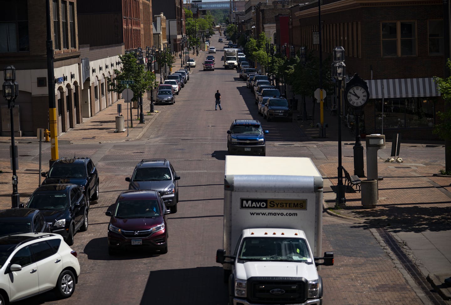 Vehicles move down First St. in Duluth on Wednesday June 24, 2020. ] ALEX KORMANN • alex.kormann@startribune.com First St. in downtown Duluth will be switched to a two-way, a major change in the flow of traffic through the heart of town.