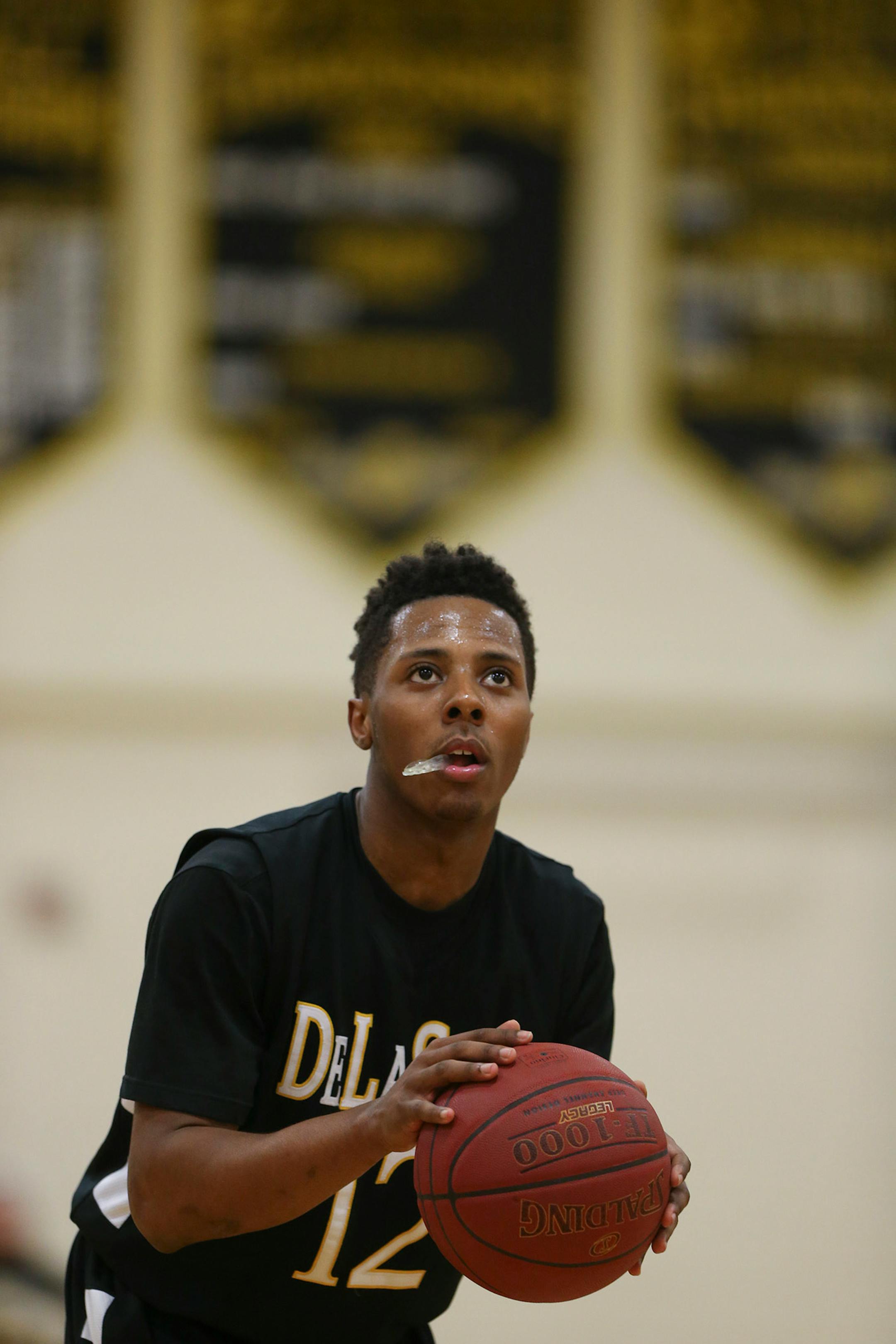 The Islanders' Jarvis Johnson concentrated on the net before shooting a free throw in the first half against Fridley. ] JEFF WHEELER ï jeff.wheeler@startribune.com DeLaSalle High School trounced Fridley 69-31 in a boy's basketball game Thursday night, February 12, 2015 at DeLaSalle. The Islanders' Jarvis Johnson is the top preps hoops player in the state and the Gophers' No. 1 recruit for 2015.