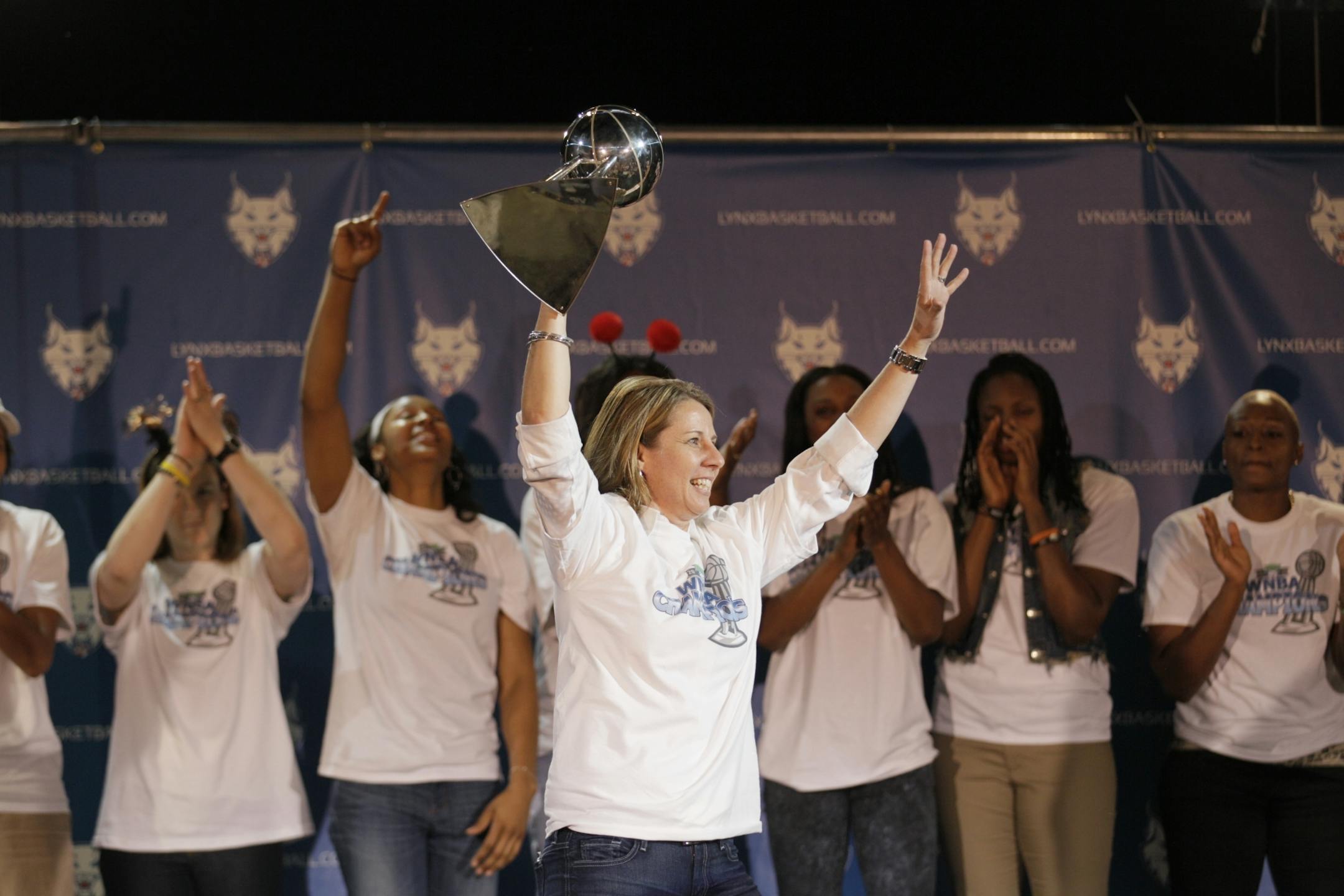 Minnesota Lynx coach Cheryl Reeve celebrates with the rest of the team and fans at Target Center Tuesday afternoon following the teams WBA championship.