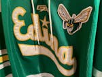 This Hornets jersey was worn in the 2013 boys hockey Class AA state tournament championship game won by Edina.