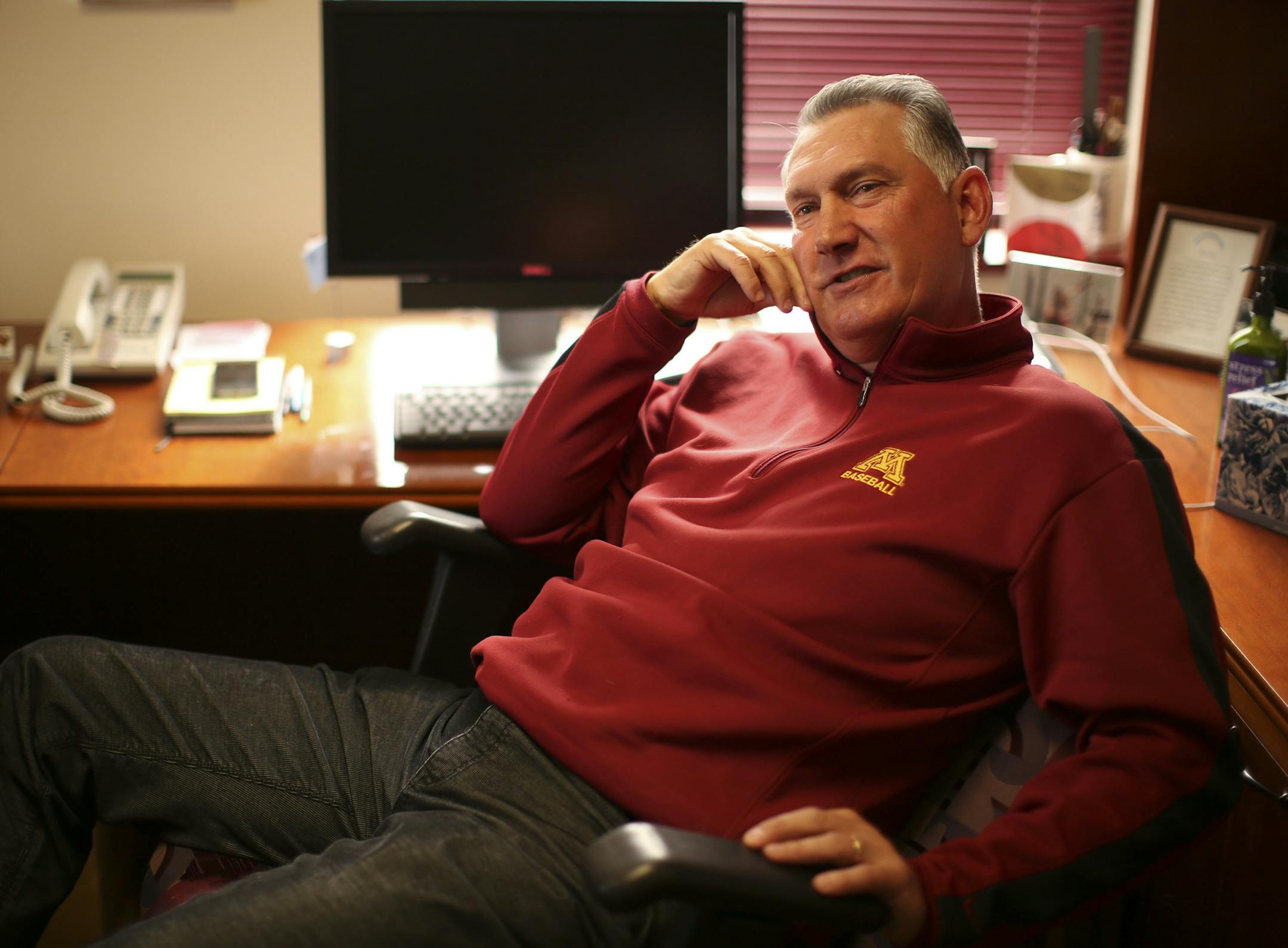 U of M head baseball coach John Anderson talked with a couple of reporters in his office Monday afternoon. ] JEFF WHEELER ‚Ä¢ jeff.wheeler@startribune.com The Minnesota Gophers baseball team is preparing for their home opener this Wednesday, which now has been postponed until Friday. After removing snow from the field over the weekend, on Monday, March 24, 2014, a crew turned to clearing snow from the stands. Head coach John Anderson also talked about the upcoming season and the
