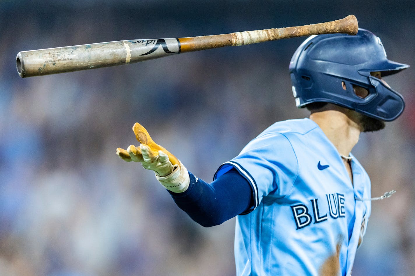 Toronto Blue Jays' Cavan Biggio tosses his bat after hitting a home run against the Minnesota Twins during eighth-inning baseball game action in Toronto, Sunday, June 11, 2023. (Mathew Tsang/The Canadian Press via AP)