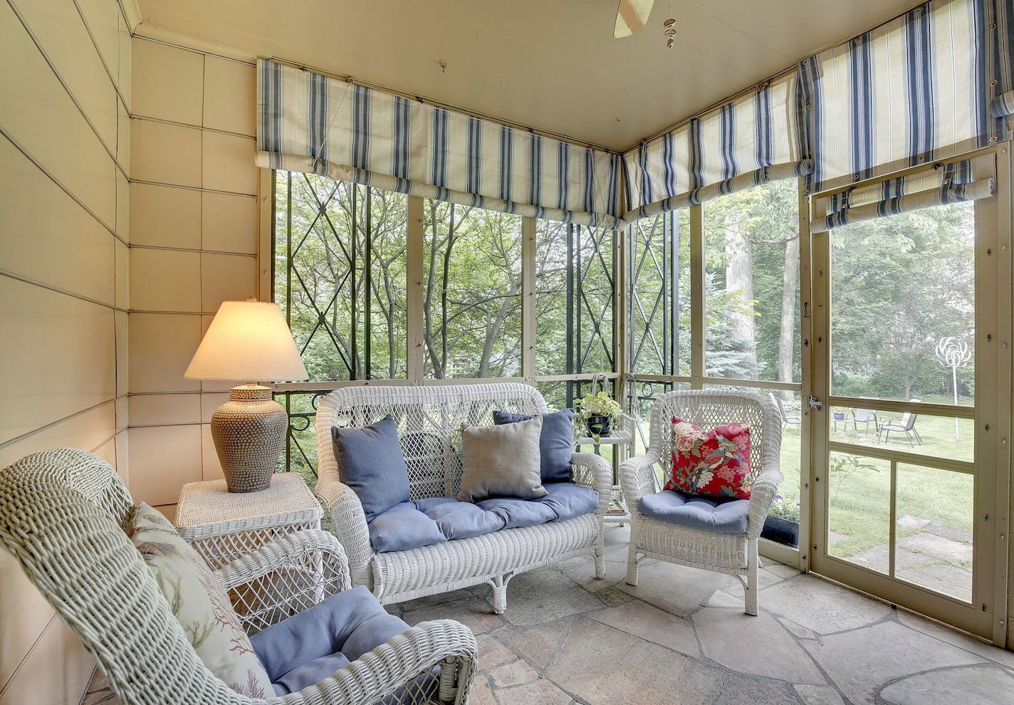 A screened porch faces the backyard.