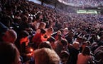 GENERAL INFORMATION: September 16, 2001. Metrodome prayers. Minneapolis, MN.
IN THIS PHOTO: An estimated 25,000 to 30,000 people attend a prayer and m