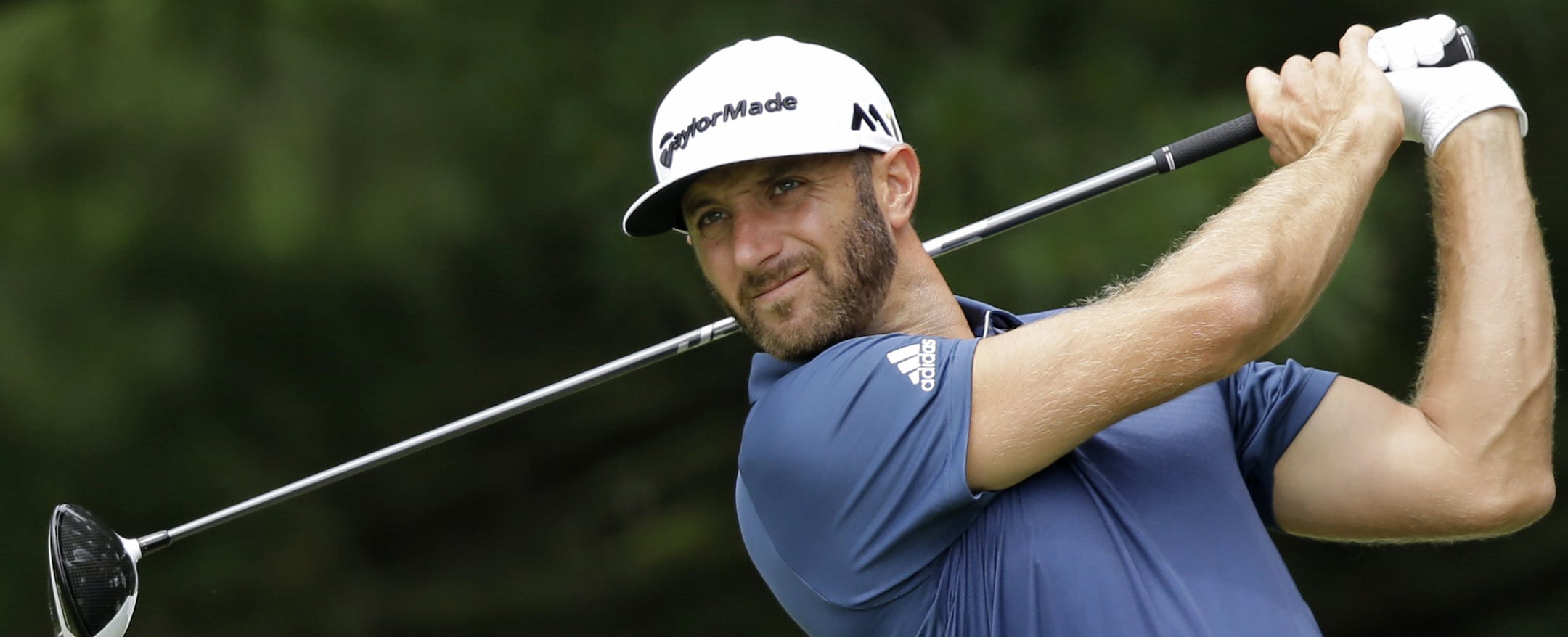 FILE- In this July 3, 2016, file photo, Dustin Johnson tees off on the second hole during the final round of the Bridgestone Invitational golf tournament at Firestone Country Club in Akron, Ohio. Johnson released a statement through one of his representatives on Friday, July 8, 2016, that he is withdrawing from the Olympics because he is concerned about the Zika virus. (AP Photo/Tony Dejak, File) ORG XMIT: NY157