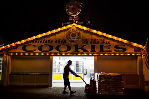 Sweet Martha's Cookie Jar gets a delivery of dry ingredients for their popular cookies at the Minnesota State Fair early in the morning on Tuesday, Se
