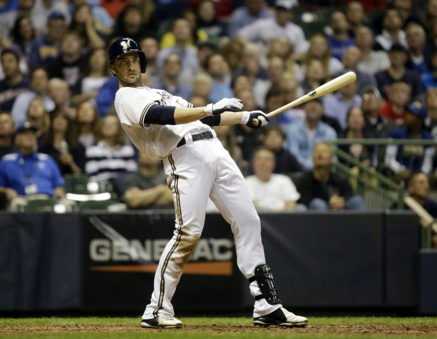 Milwaukee Brewers' Ryan Braun watches a foul ball during the fifth inning of a baseball game against the Minnesota Twins Tuesday, May 28, 2013, in Milwaukee.