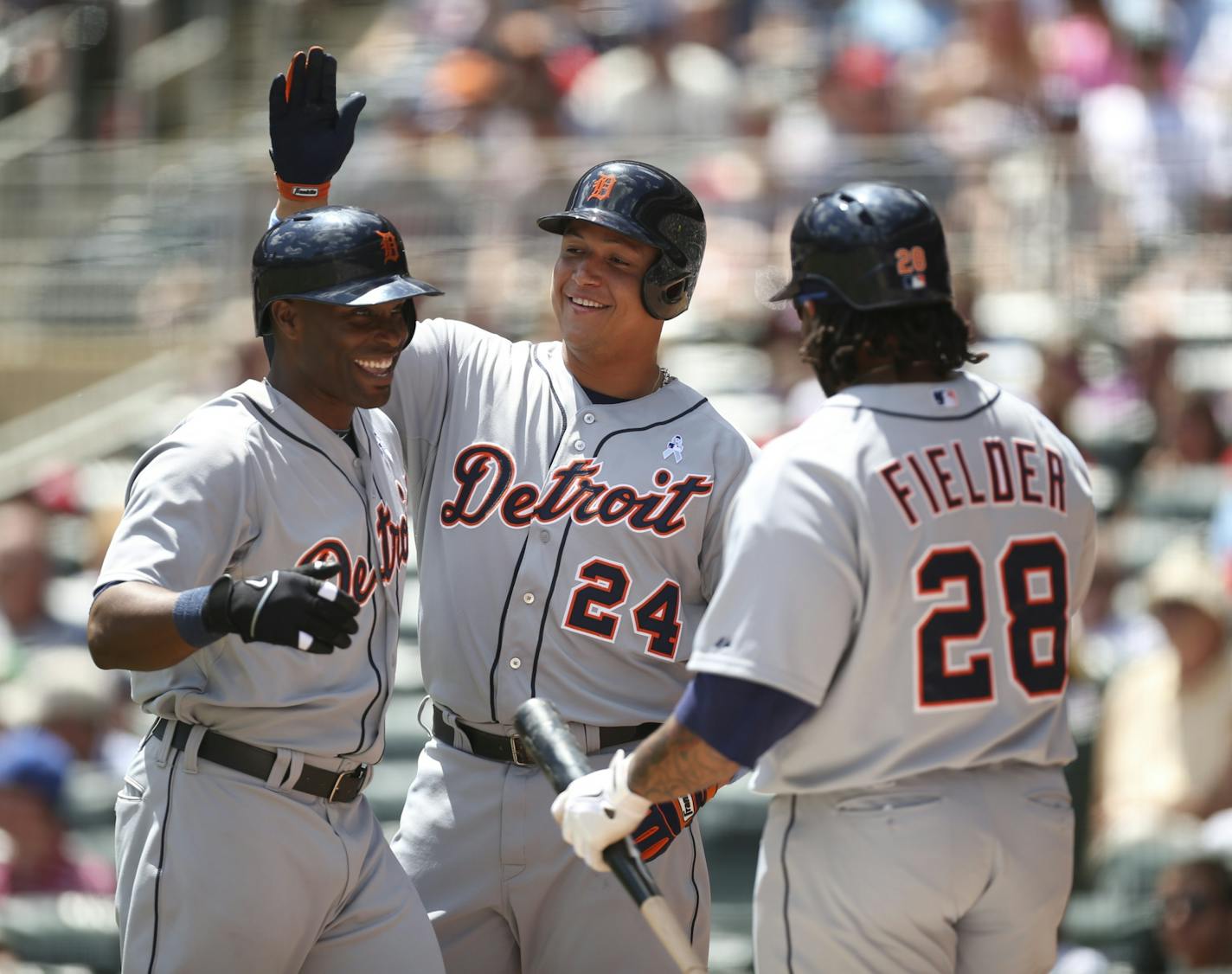 The MInnesota Twins closed out a series against the Detroit Tigers Sunday afternoon, June 16, 2013 at Target Field in Minneapolis. Torii Hunter was congratulated on his way to the dugout by Detroit Tigers teammates Miguel Cabrera and Prince Fielder after his 300th career home run, a two run shot to left field in the first inning.