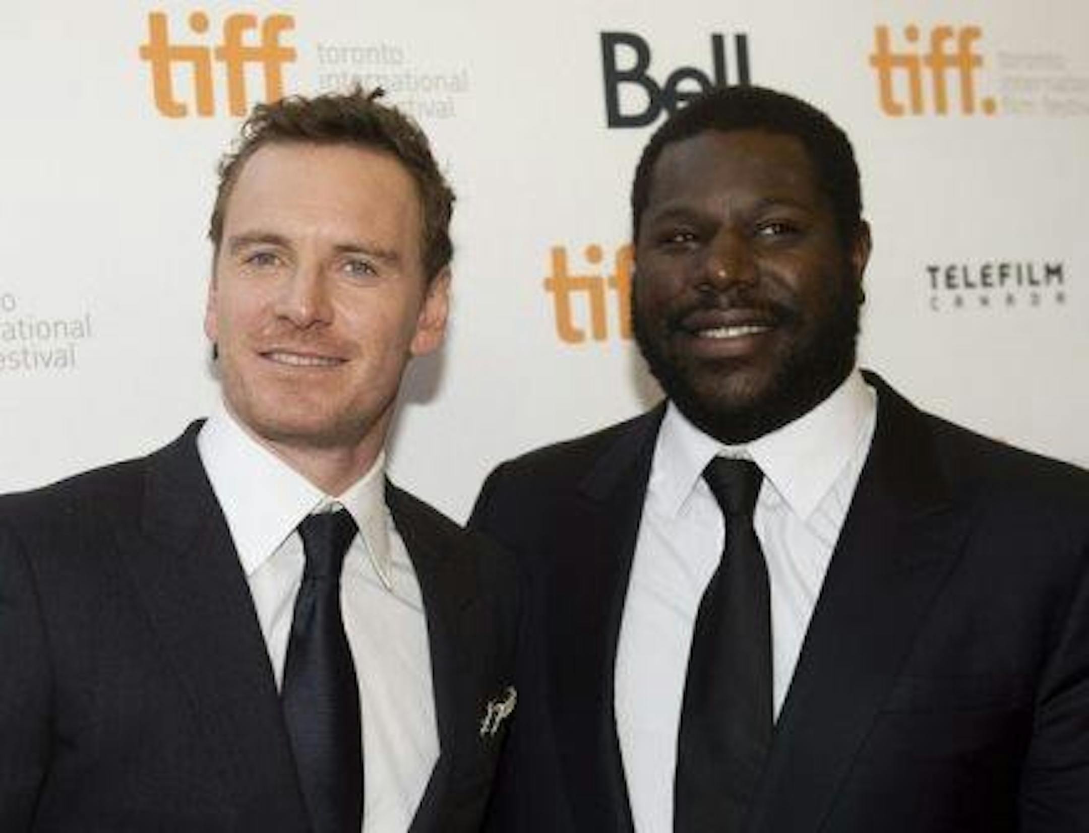 Actor Michael Fassbender, left, and director Steve McQueen at the Toronto International Film Festival. Photo: Nathan Denette, Associated Press