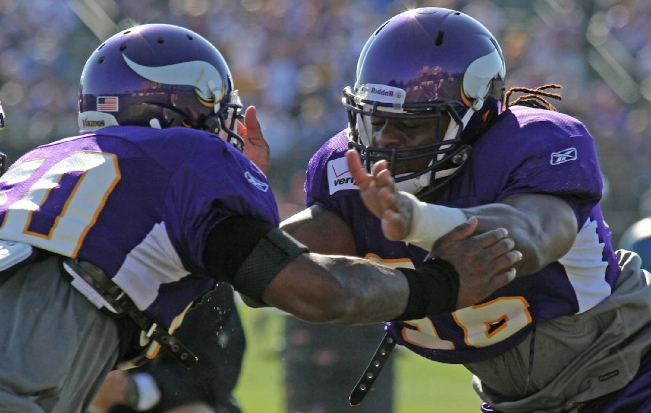 Erin Henderson and E.J. Henderson at Vikings training camp in 2011.