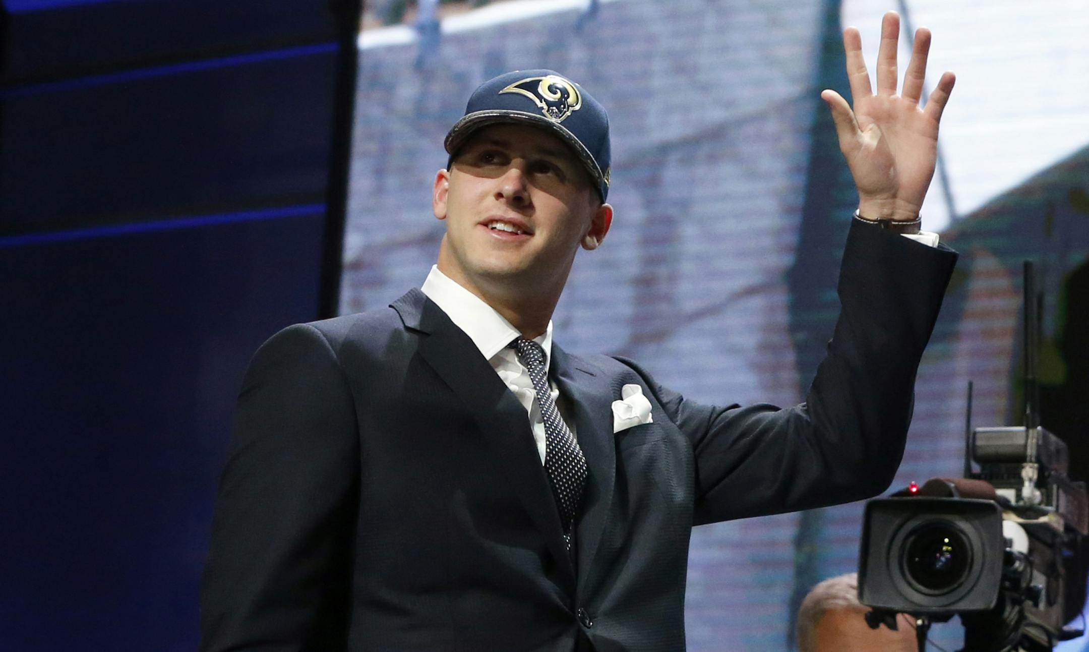 California&#xed;s Jared Goff waves as after being selected by the Los Angeles Rams as 1st pick in the first round of the 2016 NFL football draft, Thursday, April 28, 2016, in Chicago. (AP Photo/Charles Rex Arbogast)