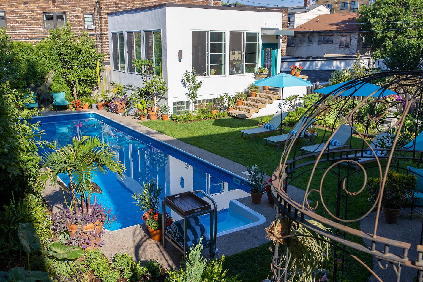 Sean Ryan and Ed Piechowski rent out their home pool to renters, Wednesday, June 30, 2021 in St. Paul, MN. They are part of a growing trend of pool owners who are using the Swimply app, called the Airbnb of pools, to rent out to people by the hour. ] ELIZABETH FLORES • liz.flores@startribune.com