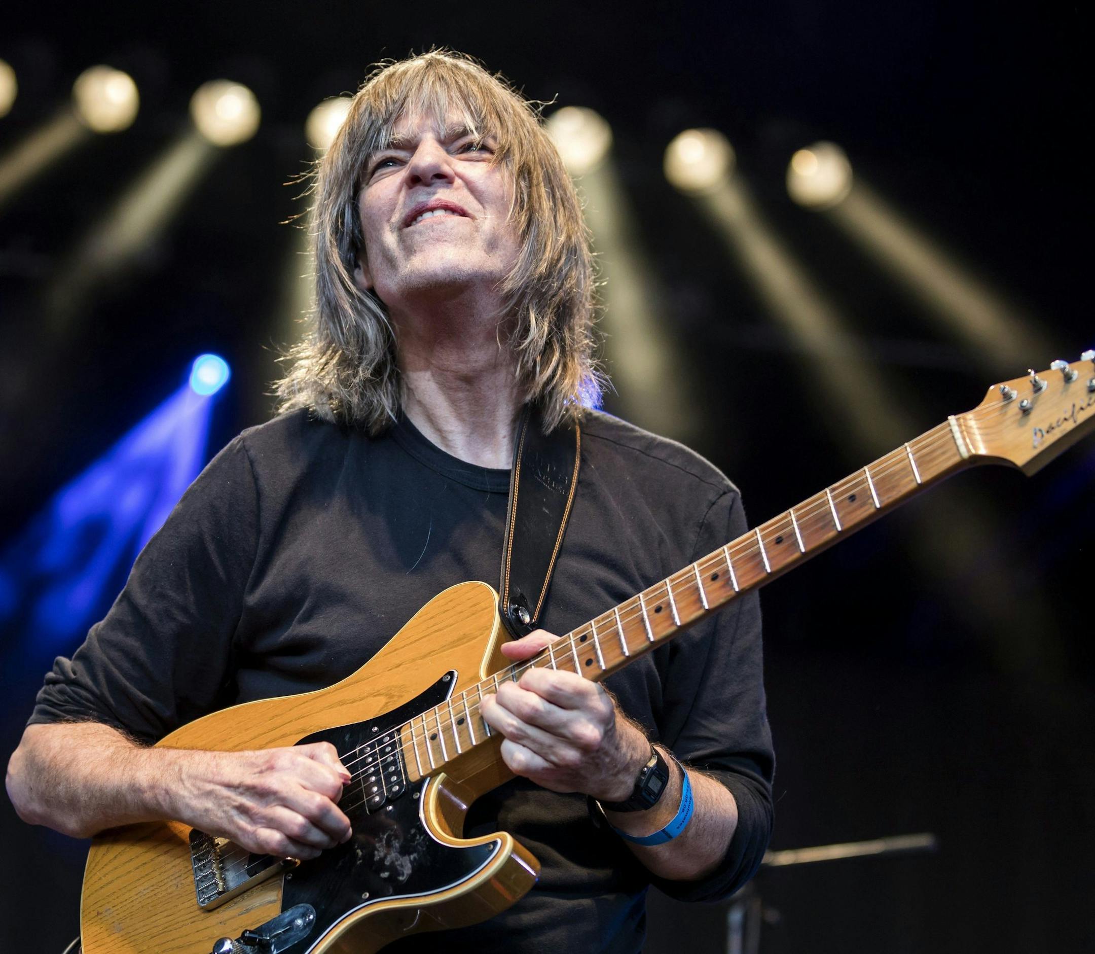 In this Aug. 8, 2017 photo US jazz guitarist Mike Stern performs during the concert of Hungarian-born German musician Leslie Mandoki's all-star formation ManDoki Soulmates in Budapest Park in Budapest, Hungary. (Balazs Mohai/MTI via AP)