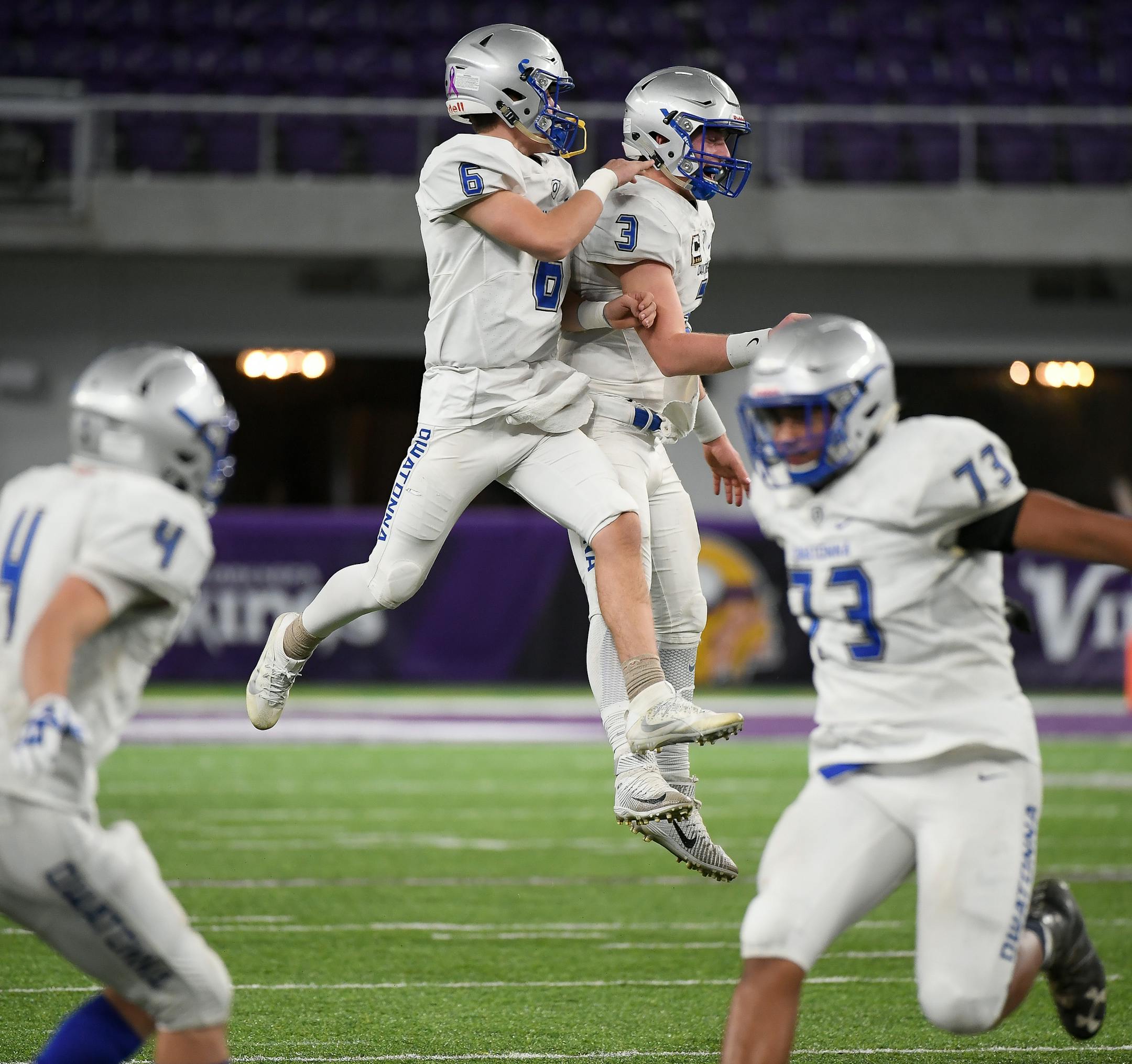Owatonna players, including quarterback Abe Havelka (3) and quarterback Sol Havelka (6), celebrated their 56-28 victory over Brainerd Saturday night. ] AARON LAVINSKY ï aaron.lavinsky@startribune.com Owatonna played Brainerd in a Class 5A State Tournament semifinal game on Saturday, Nov. 18, 2017 at US Bank Stadium, in Minneapolis, Minn.